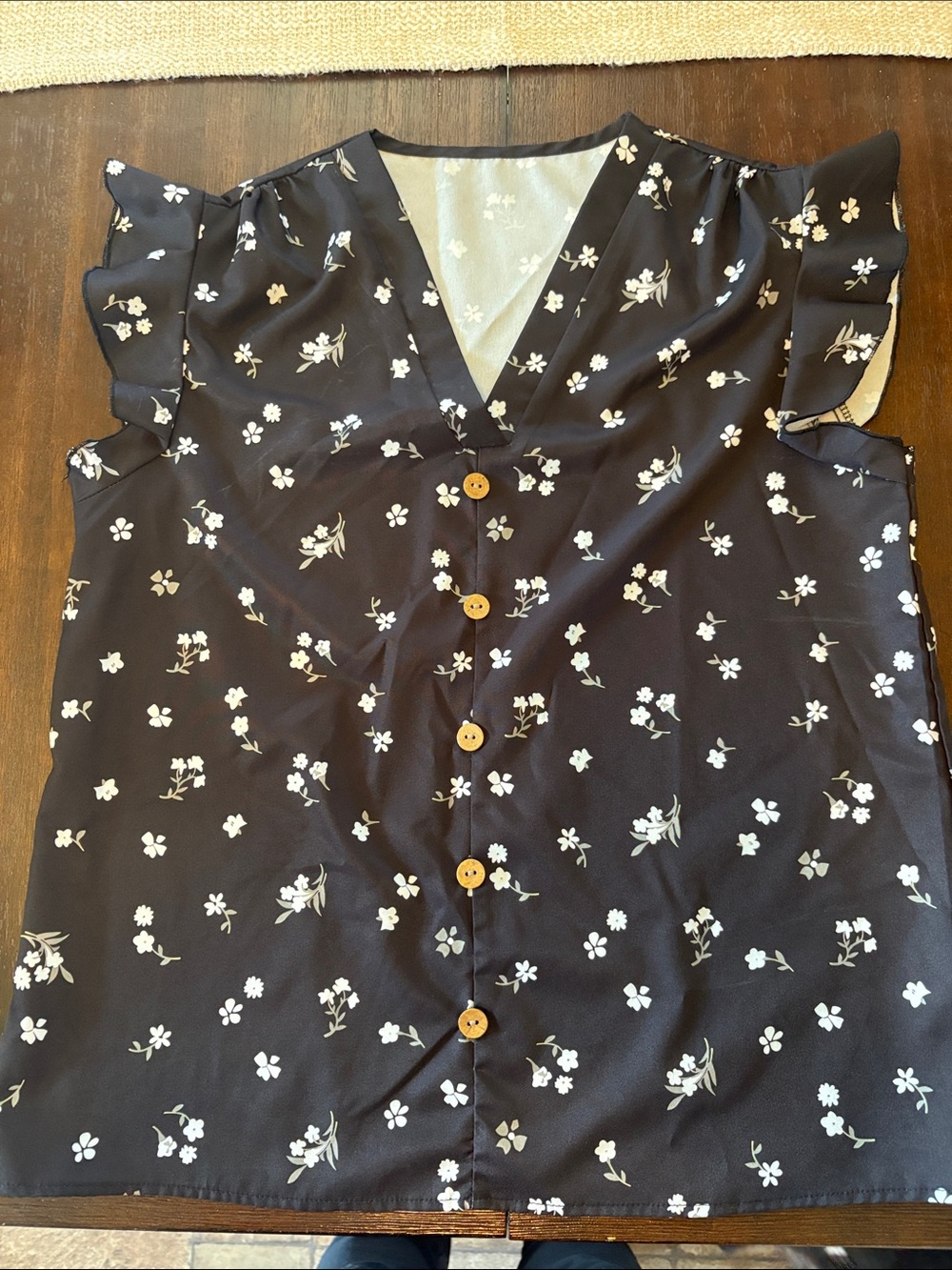 Cap sleeve dress shirt with button and floral accents